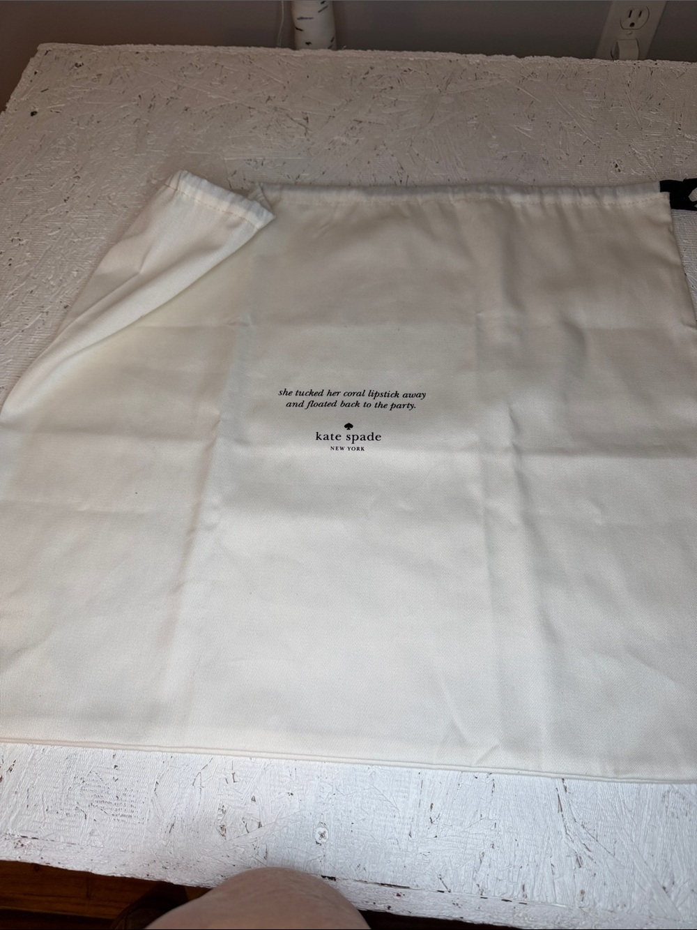 Kate Spade EUC dust bag cream color with black lettering. size 19 1/2 x 17 1/2”